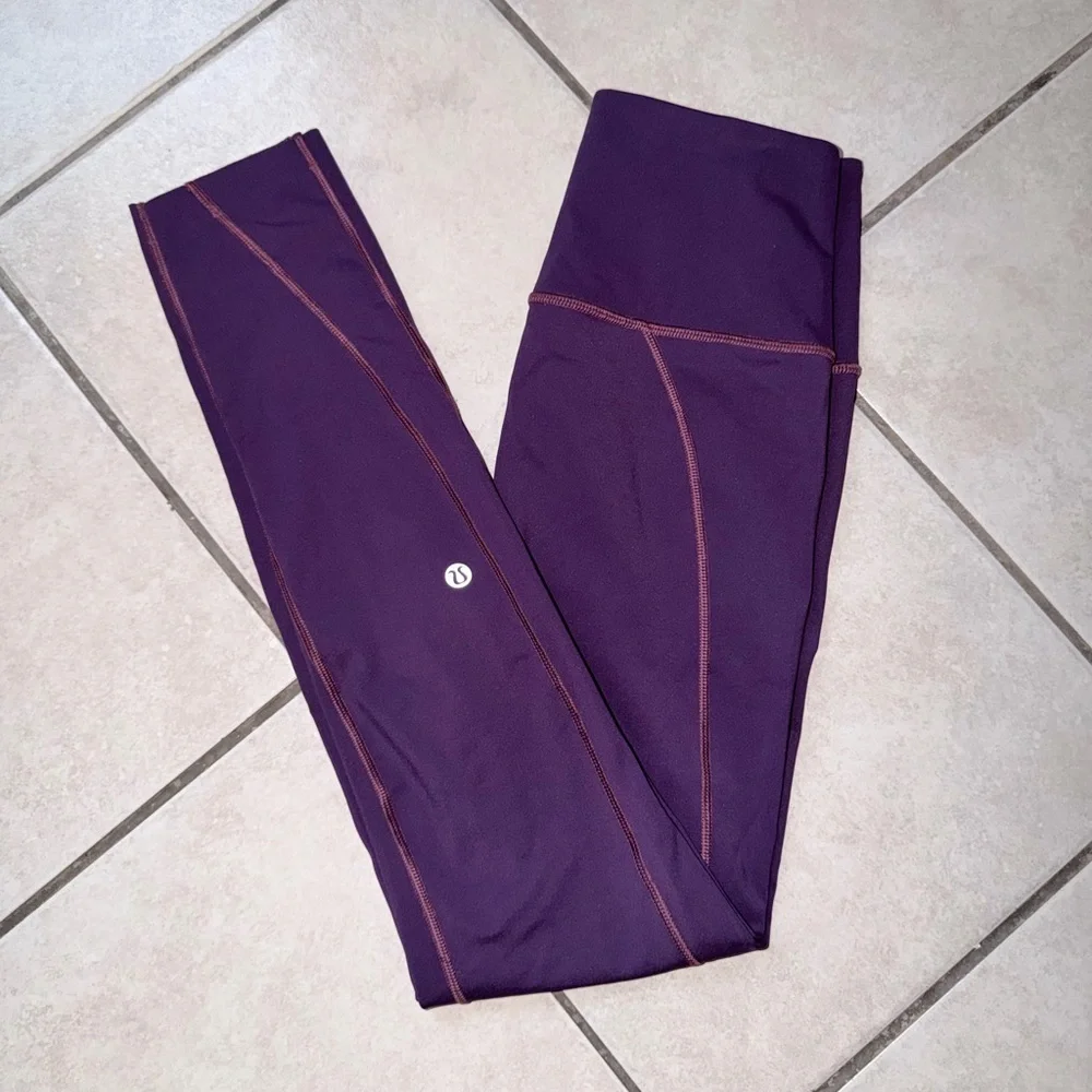 LULULEMON LIKE NOTHING DARK MAGENTA COLOR 25” LEGGING SIZE 4 WAIST 12.5” EUC